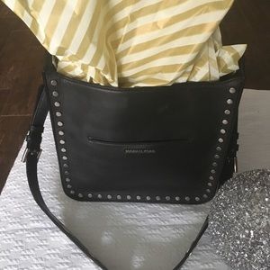 Michael Kors never used